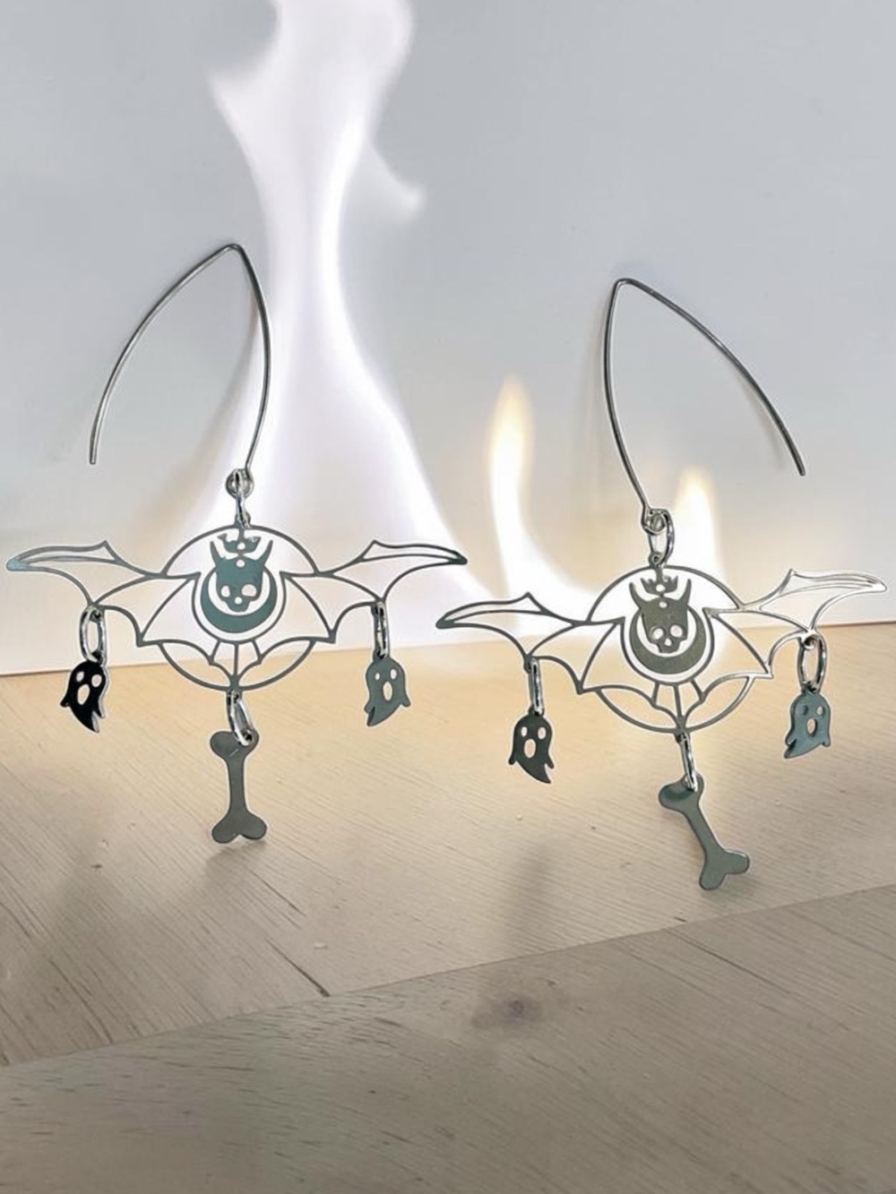 🆕 Horned Skulls on Batwings with Ghosts and Bones Laser Cut Earrings